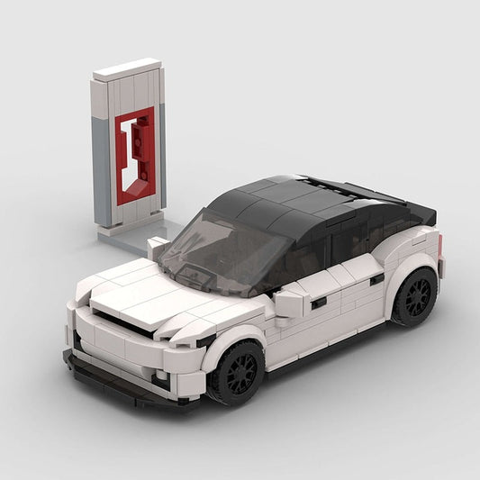 Tesla Model 3 mit Ladesäule